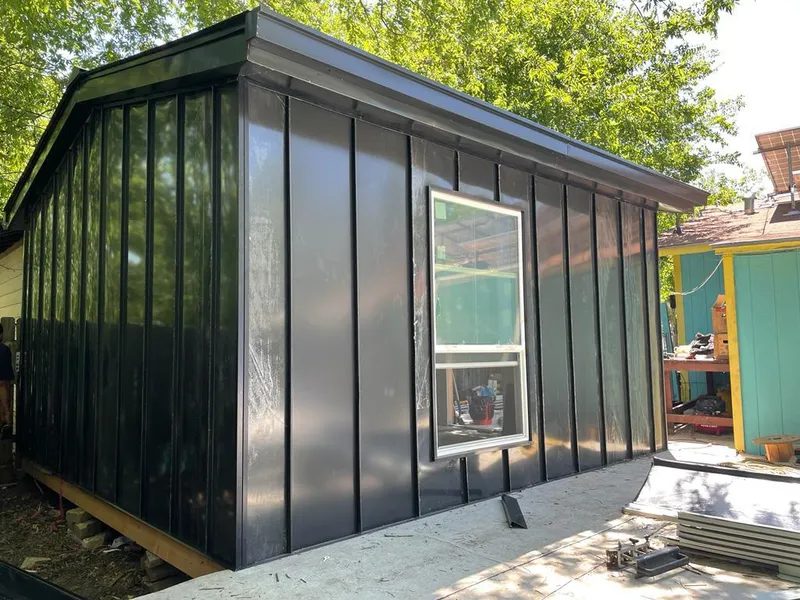 Black standing seam metal wall panels for Roof Inspection in Rayne