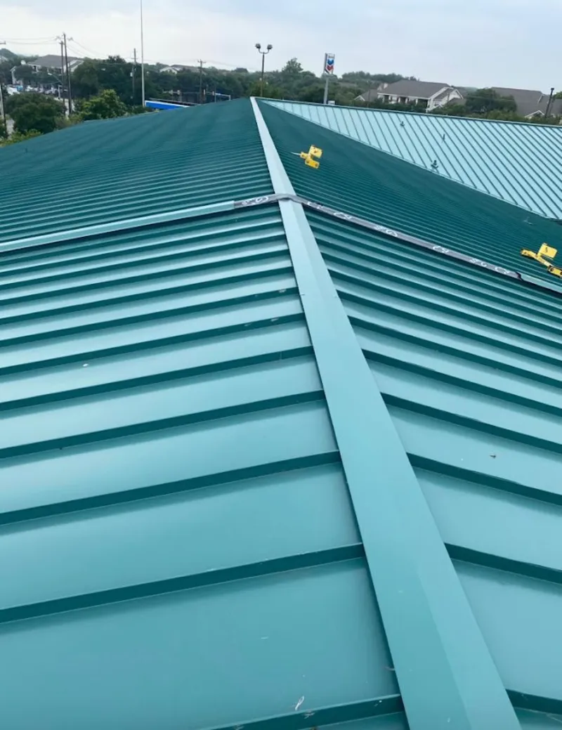 Green commercial metal roof ridge and valley for Metal Roof Repair in Rayne